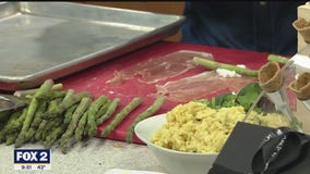 Chef Bobby prepares prosciutto-wrapped asparagus