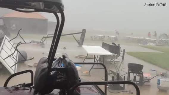 Severe thunderstorm causes inflatable slide to go airborne in Alabama