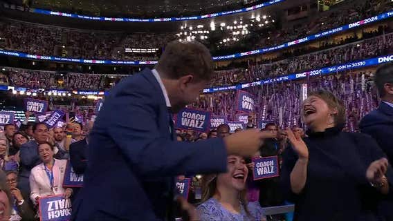 Gus Walz tearfully cheers on his father as he accepts VP nomination