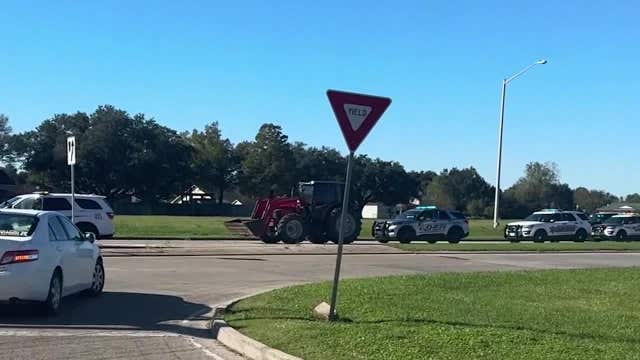 Watch: Police chase ends with tractor takedown