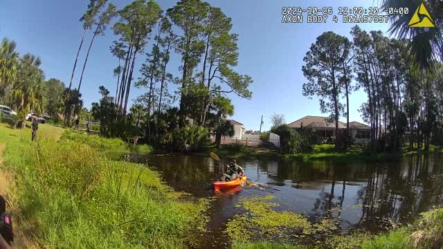 Florida deputy rescues dog stuck in pond: 'My hero!'