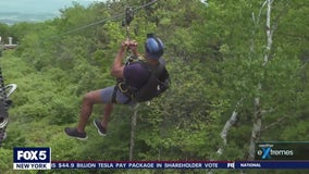 NYC meteorologist does the longest zipline in America