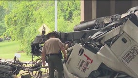 Semi rolls over on I-80, falls onto roadway below killing driver