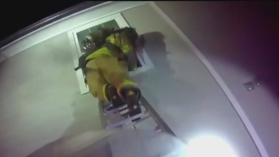 Watch: Trapped toddler rescued from burning apartment in Granbury