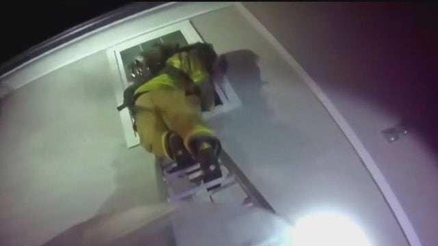 Watch: Trapped toddler rescued from burning apartment in Granbury