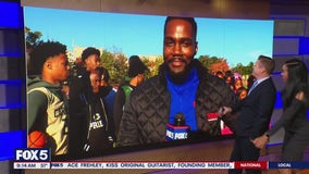 Preparing for the game at Archbishop Carroll High School