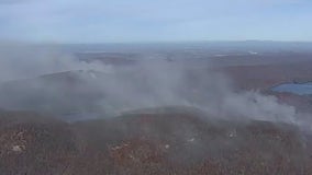 Firefighters battling fires in the northeast