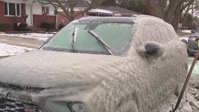 Dearborn Heights water main break leaves vehicles trapped in coating of ice