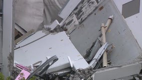 Wall collapses at postal facility