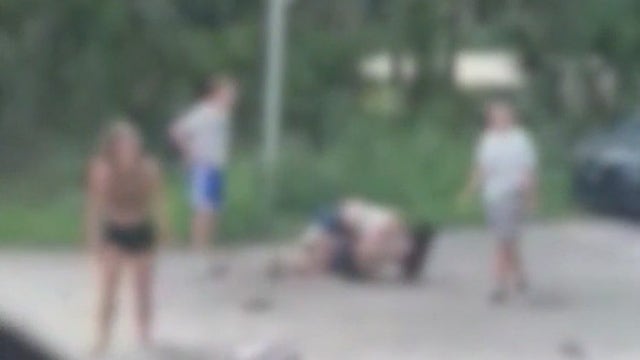 VIDEO: Flagler-Palm Coast High School mom arrested for allegedly joining daughter's bus stop fist fight