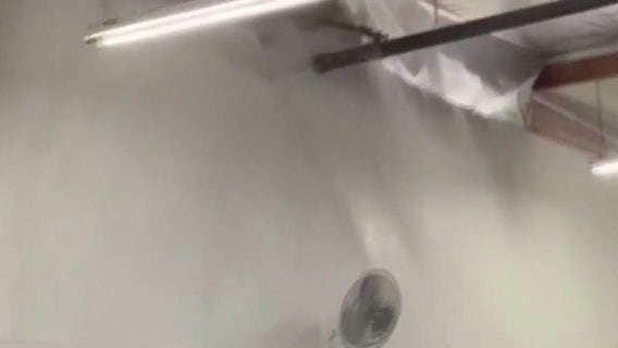 Rare CA storms tear holes in roofs, flood roads