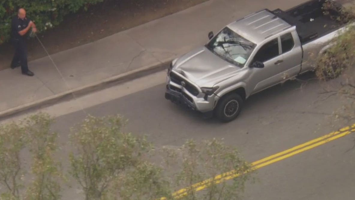 Police use spike strips on slow-speed pursuit vehicle