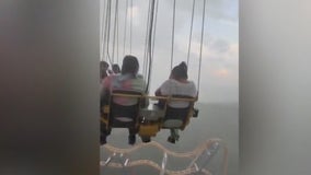 Riders trapped on ride during storm