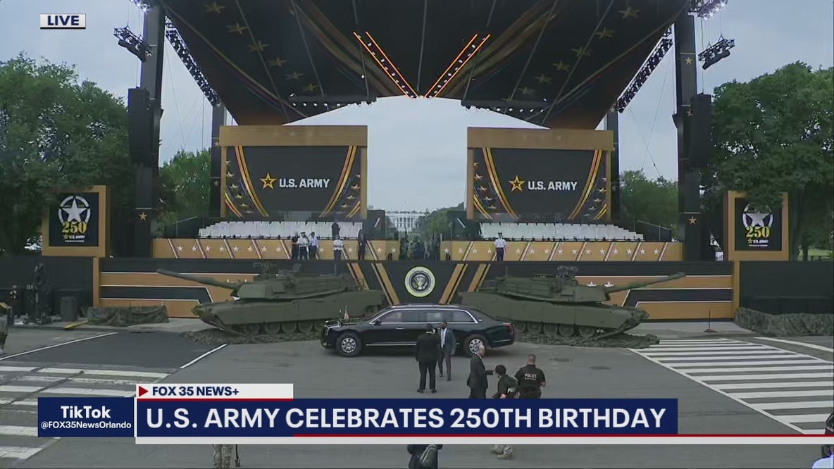 Residents wave flags to celebrate U.S. Army's birthday