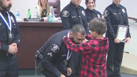 8-year-old reunited with cops who saved him