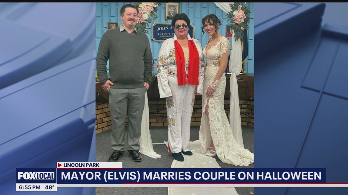 A hunk, a hunk of burning love: Mayor dressed as Elvis performs wedding ceremony