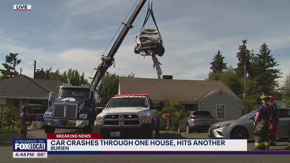 Car crashes through one house, hits another in Burien, WA