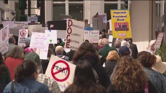 Protesters target Tesla, Elon Musk, Trump in East Bay march