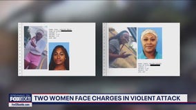 Two women face charges in violent attack