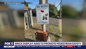 Mystery Arlington resident sparks pedestrian safety conversation with foam brick display