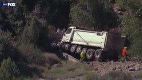 Dump truck goes over embankment in Yavapai County