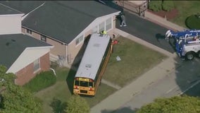 Three hospitalized after school bus crashes into Skokie home: officials