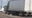 Car crashes into semi, gets wedged underneath