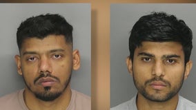 Liquor store manager, friend charged with holding a man hostage
