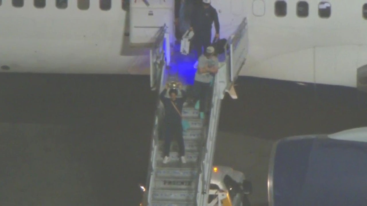 Yoshinobu Yamamoto back with World Series trophy | FOX 11 Los Angeles