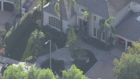 FBI at home linked to murdered Doctor's ex-wife