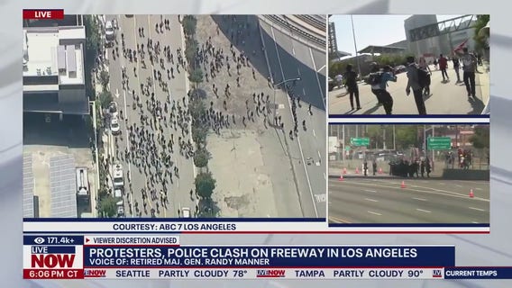 Protesters, police clash on freeway in Los Angeles