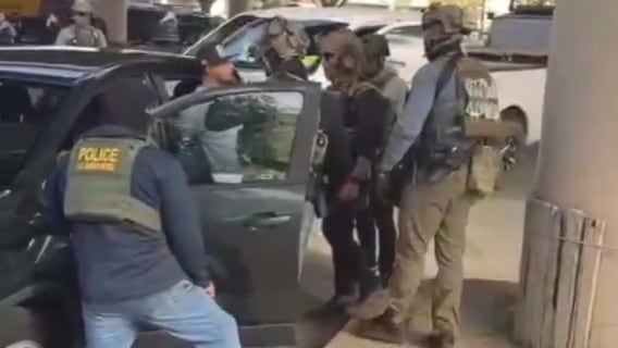 Dad detained while baby watches from backseat