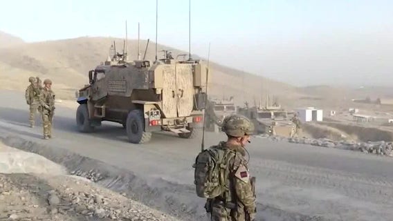 Trump signs order to bar transgender troops from military