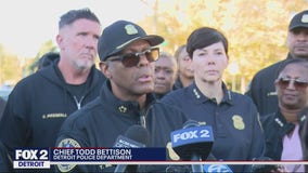 Woman shot after threatening Detroit officer