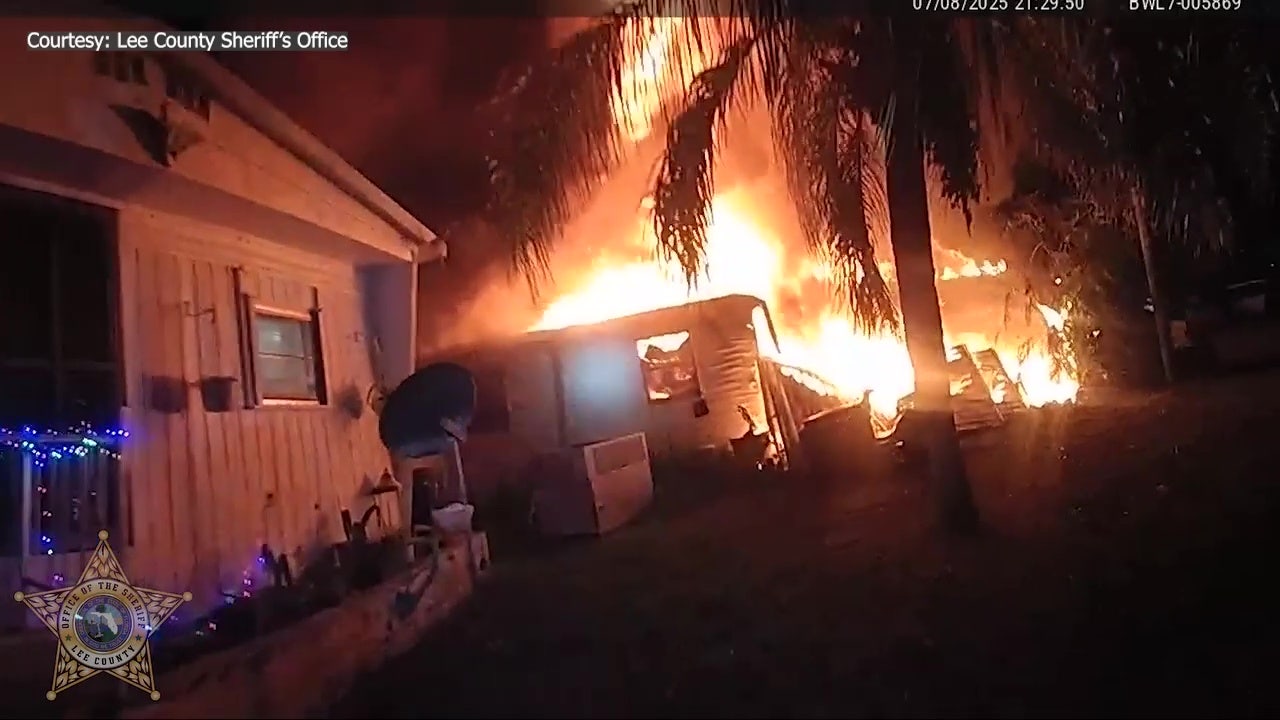 Florida deputies rescue couple from burning home