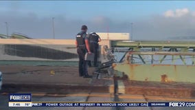 Tractor trailer cab careens off Delaware Memorial Bridge, into river below