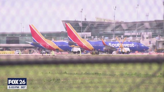 Southwest Airlines flight returns to Houston; passengers exit on taxiway