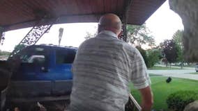 Man watches as truck collides with his garage in Sterling Heights