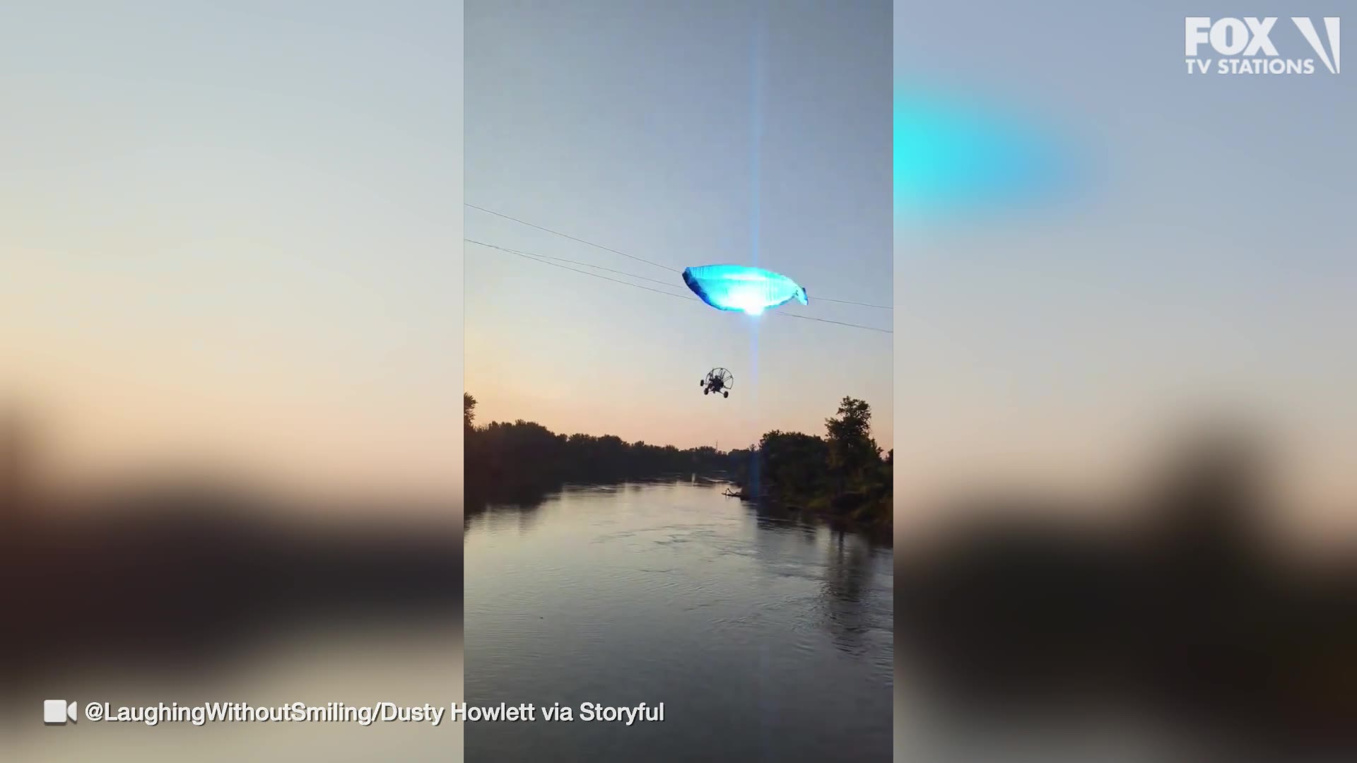 Paraglider strikes power line, crashes into river: Video