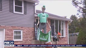 Delco 12-foot skeleton decorated for every occasion is popular attraction