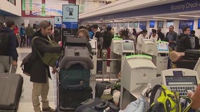 Holiday travel rush kicks into high gear