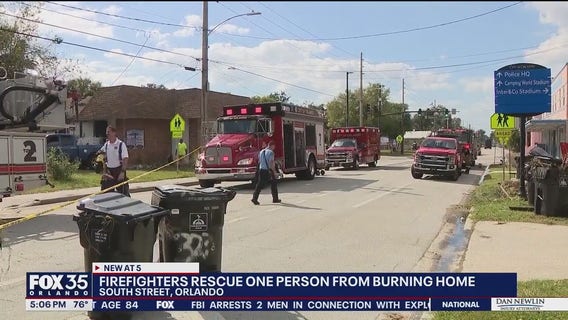 Orlando firefighters rescue 1 from burning home