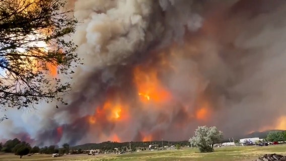At least 2 dead, over 1,400 structures burned as New Mexico wildfires rage