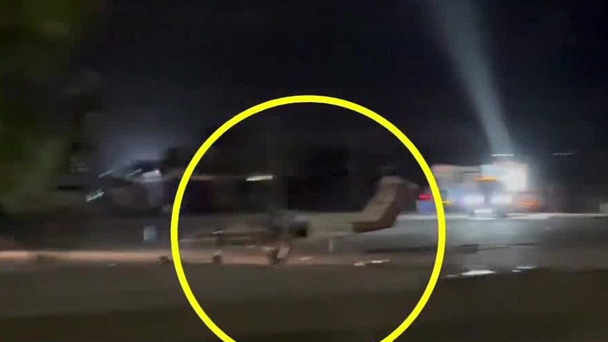 1 hurt after plane makes crash-landing in parking lot
