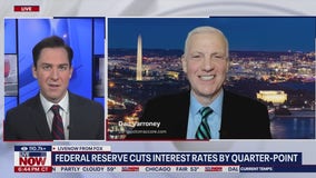 Federal Reserve cuts interest rates by quarter-point