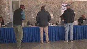 In-person early voting delays improve