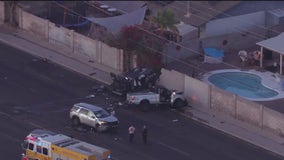 Multi-car crash leaves barrier wall destroyed, 4 people hospitalized