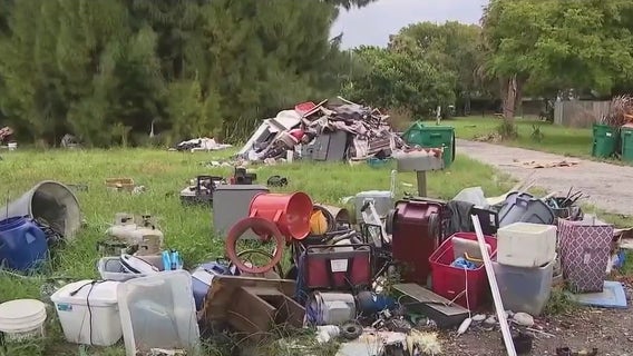 Florida homeowners frustrated with trash piles accumulating at vacant home: 'Nothing is getting done'