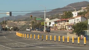 Parts of PCH reopen amid firefight in Malibu