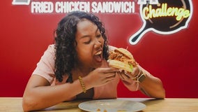 Woman competing in fried chicken sandwich showdown